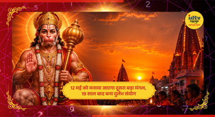 Devotees offering prayers to Lord Hanuman during Bada Mangal celebrations with lamps and flowers