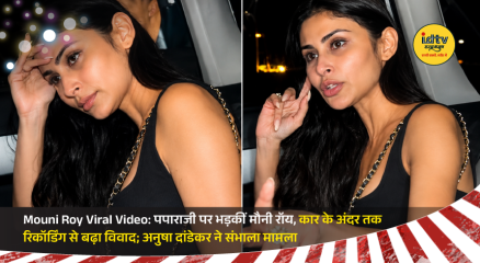 Mouni Roy reacts to paparazzi while sitting in a car after a restaurant outing with Anusha Dandekar in Mumbai.