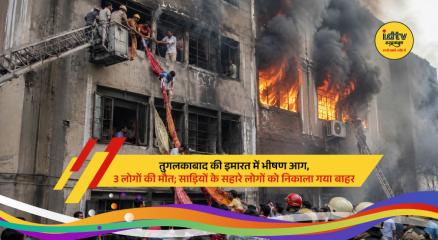 Firefighters conduct rescue operations after a deadly building fire in Delhi's Tughlaqabad area.